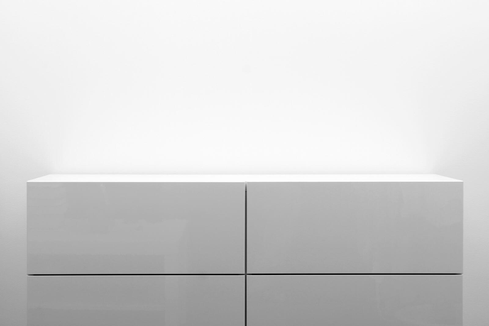 white commoda in bright minimalism interior
