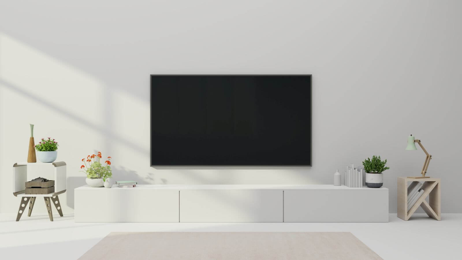 TV on the cabinet in modern living room with plant on white wall background,3d rendering