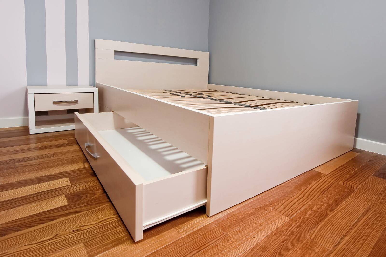 Bed with open drawer
