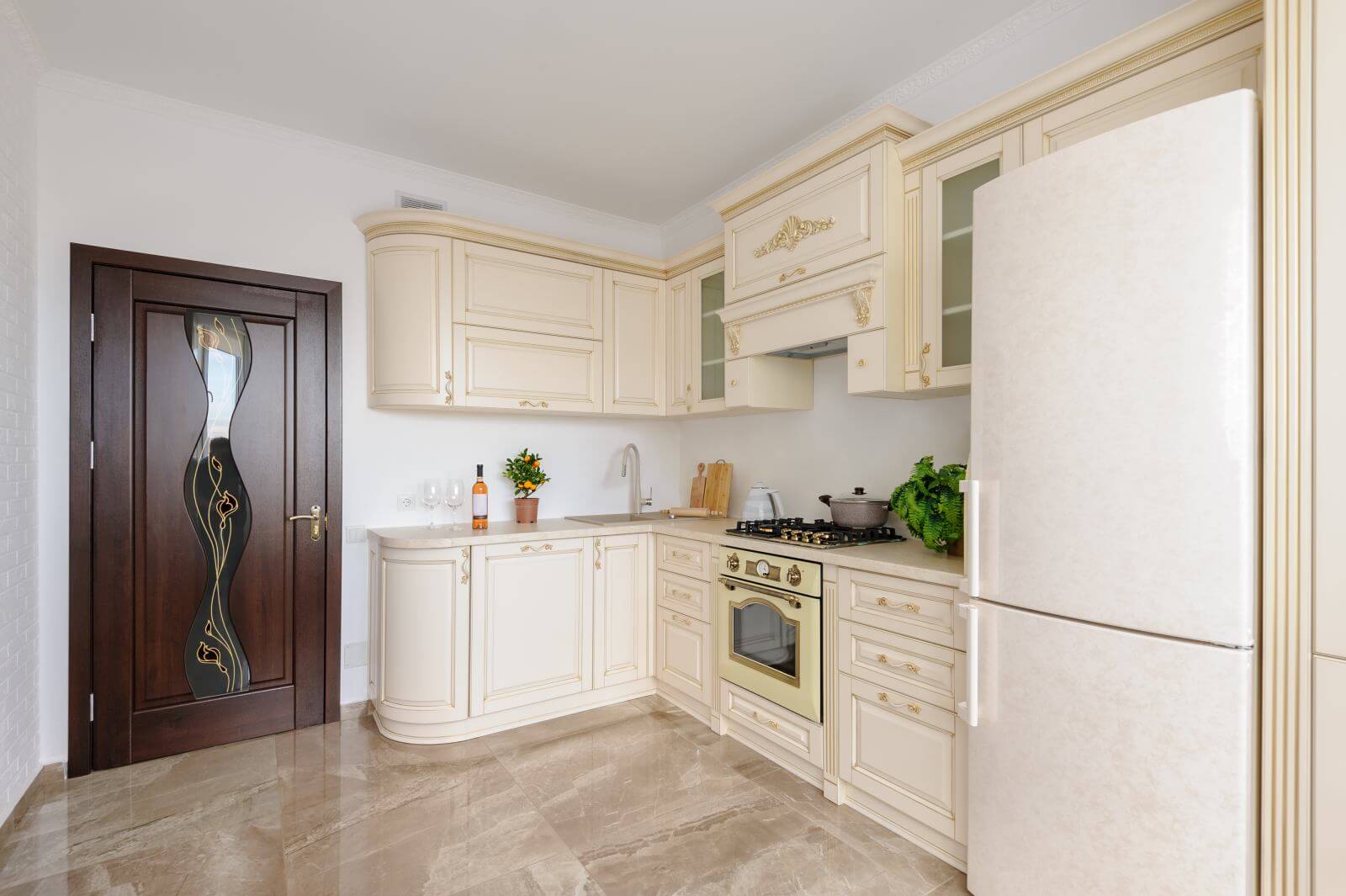 Modern spacioius beige colored luxury kitchen, clean design