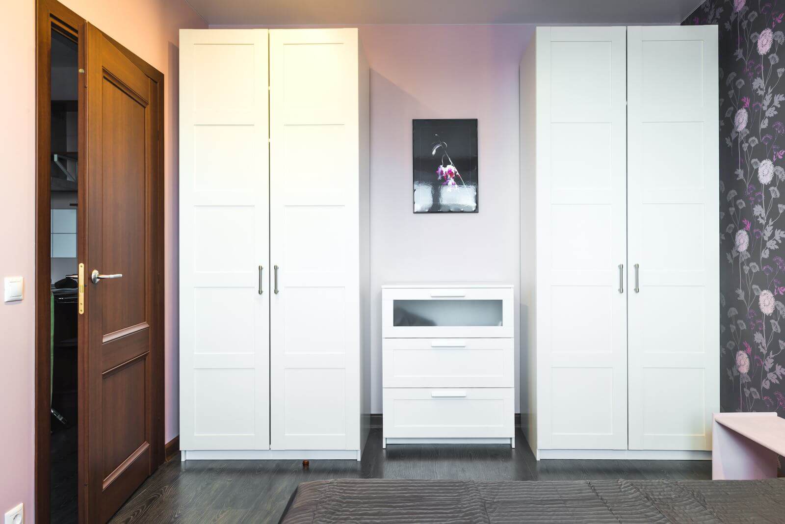 Interior bedrooms with wardrobes and a chest of drawers
