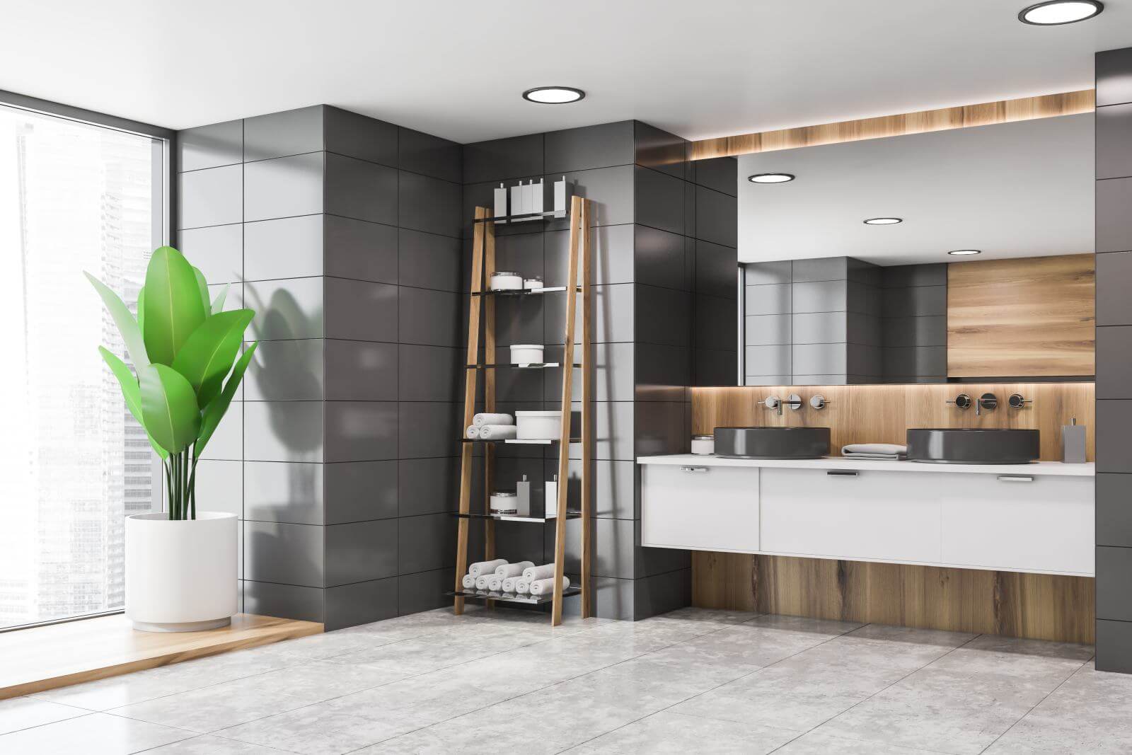 Corner of stylish bathroom with gray tile and wooden walls, double sink on white countertop with large mirror above it and rack with towels and creams. 3d rendering