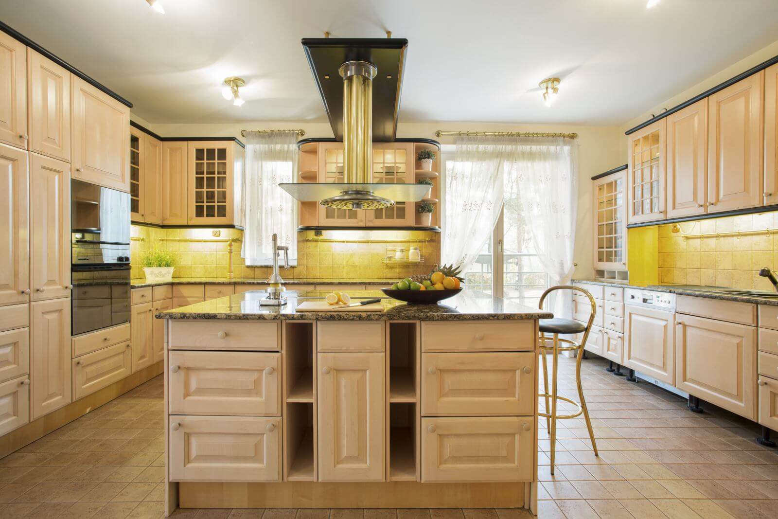 Old fashioned spacious kitchen with island